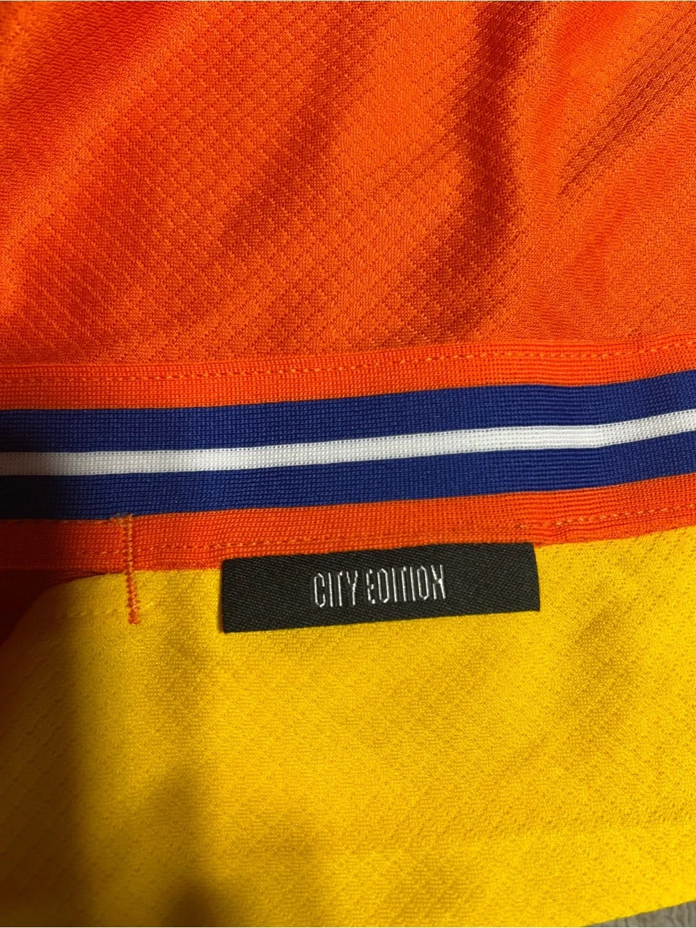 Jordan Charlotte Long Sleeve Team Shirt in Orange and Yellow